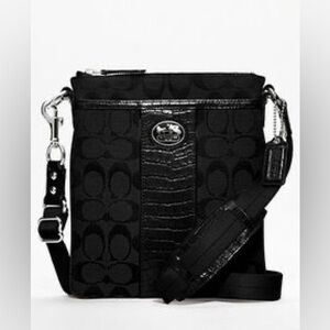 Coach black signature stripe swingpack